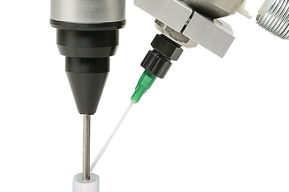 A specially engineered Rotospray applicator applies a metered amount of adhesive